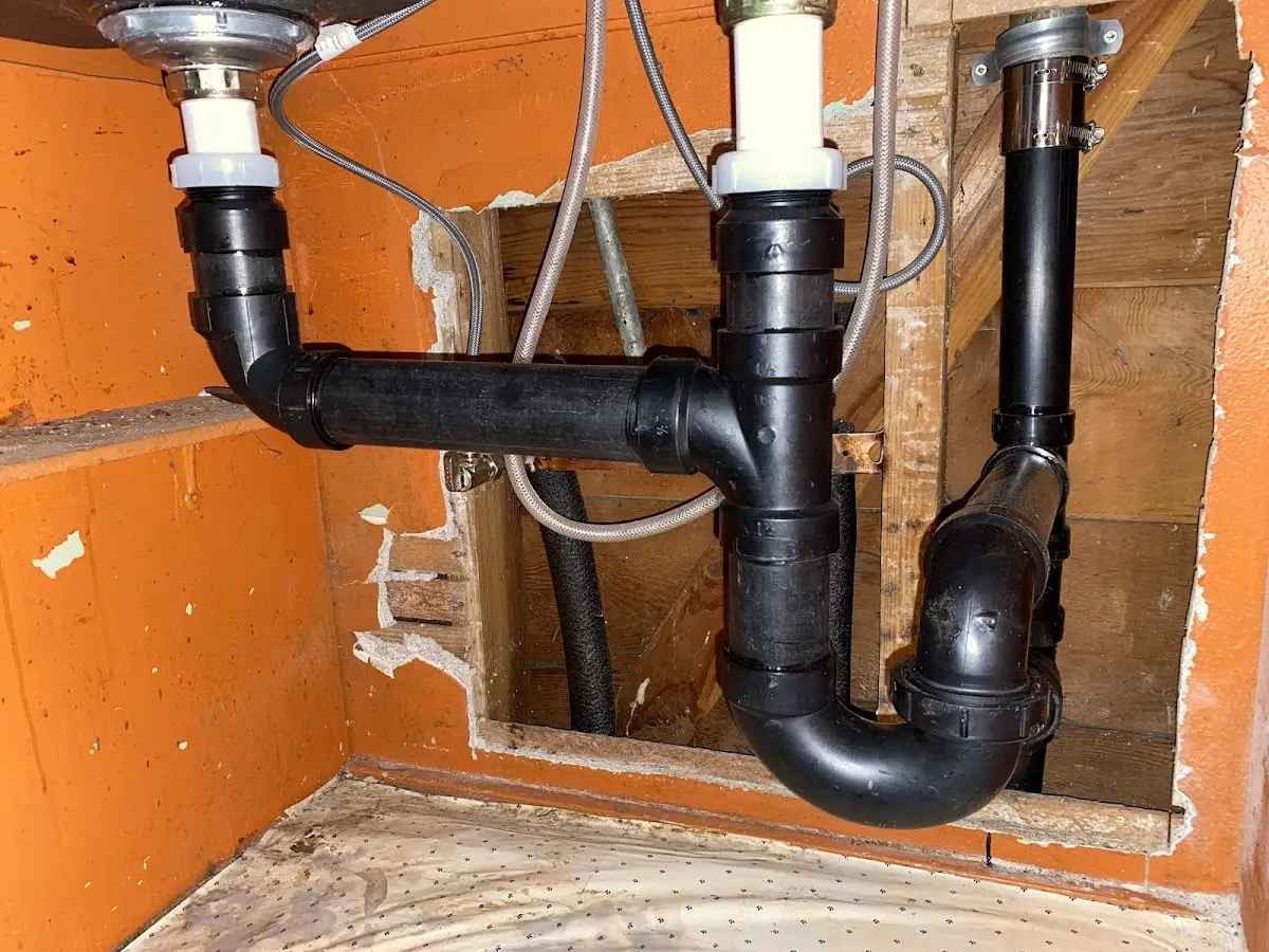 Professional Garbage Disposal Repair equipment and tools on the job in East Palo Alto
